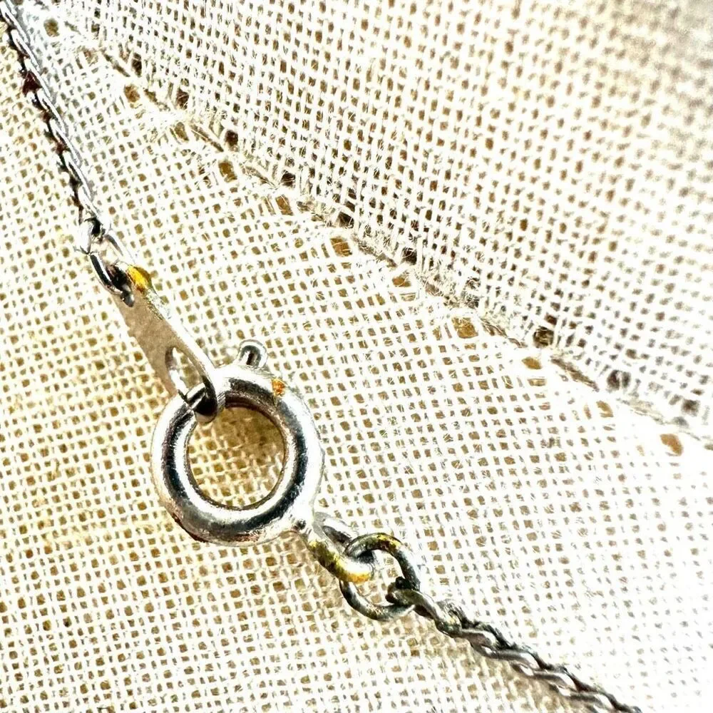 Gold tone pendant necklace